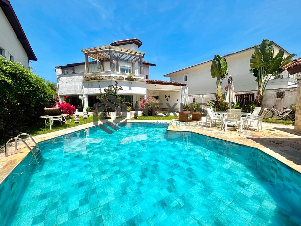 Foto 9 de Casa reformada com piscina e área gourmet no Jardim Acapulco, Guarujá