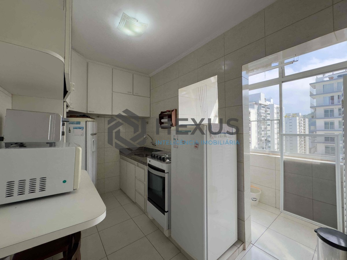 Foto 19 de Apartamento com varanda e vista mar na quadra-mar da Praia das Pitangueiras à venda, Guarujá-SP.