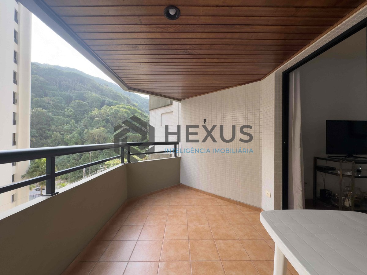 Foto 4 de Apartamento com varanda e lazer na beira mar da Praia das Pitangueiras, Guaruja