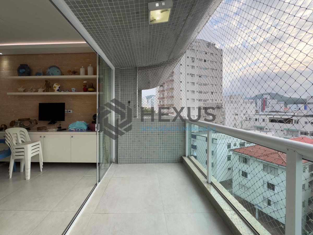 Foto 11 de Apartamento reformado com varanda na Praia das Astúrias, Guarujá