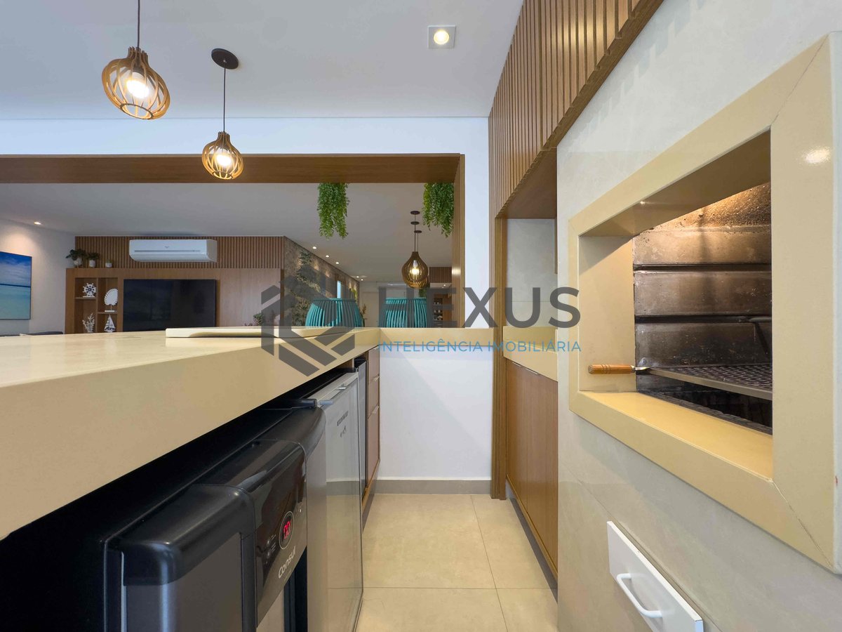 Foto 6 de Apartamento reformado com varanda gourmet e lazer na Praia das Pitangueiras, Guaruja