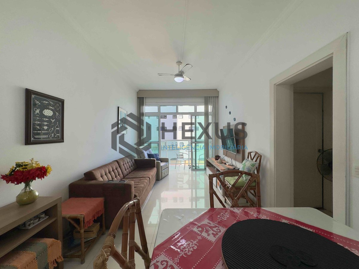 Foto 3 de Apartamento com varanda e vista mar a uma quadra da Praia das Pitangueiras de 2 quartos com 1 vaga, Guarujá-SP
