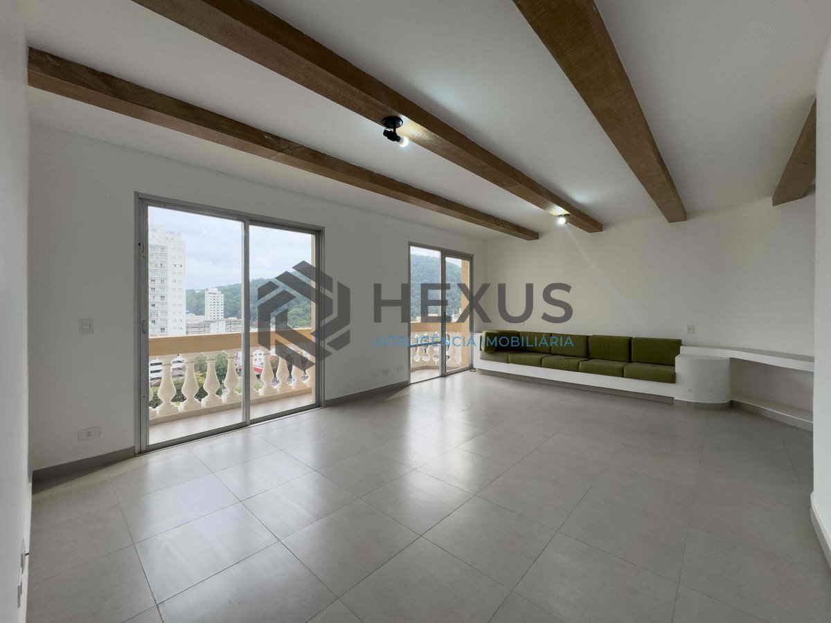 Foto 2 de Apartamento com varanda e vista livre a uma quadra da Praia das Pitangueiras de 3 quartos (1 suíte), 1 vaga, Guarujá-SP.