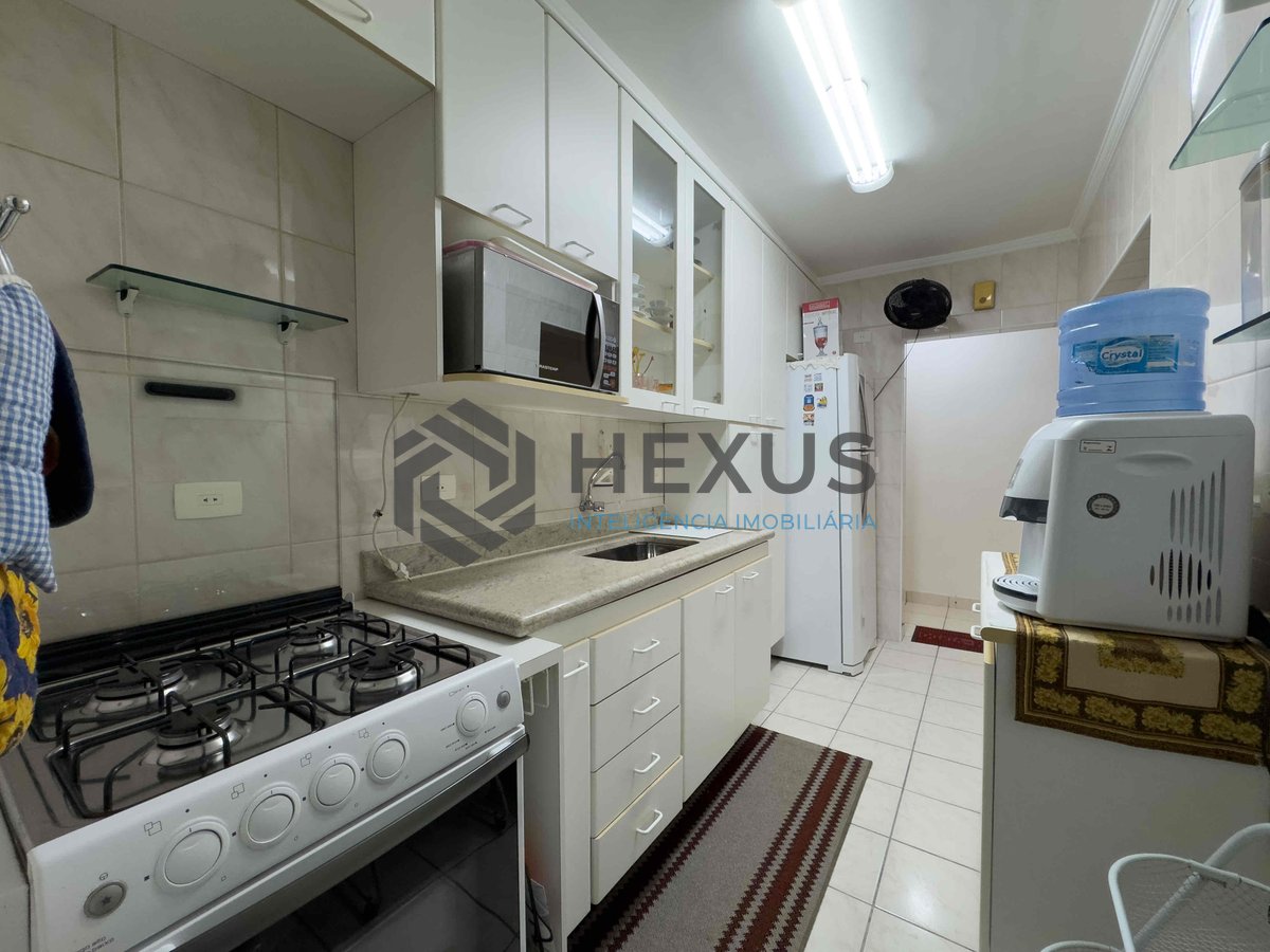 Foto 16 de Apartamento com despesas baixas a duas quadras da Praia das Pitangueiras de 2 quartos com 1 vaga, Guarujá-SP
