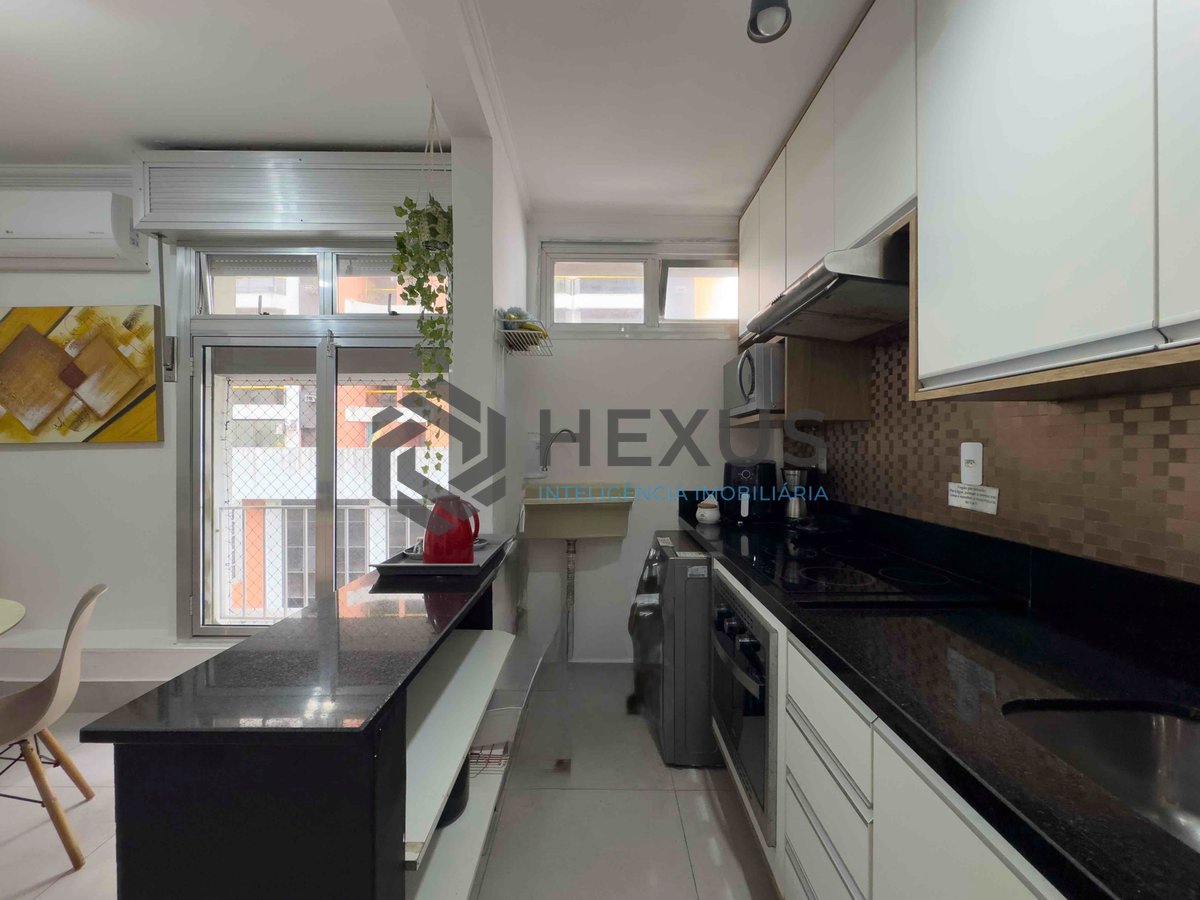 Foto 16 de Apartamento reformado e mobiliado a uma quadra da Praia das Pitangueiras de 2 quartos (1 suíte) com 1 vaga, Guarujá-SP