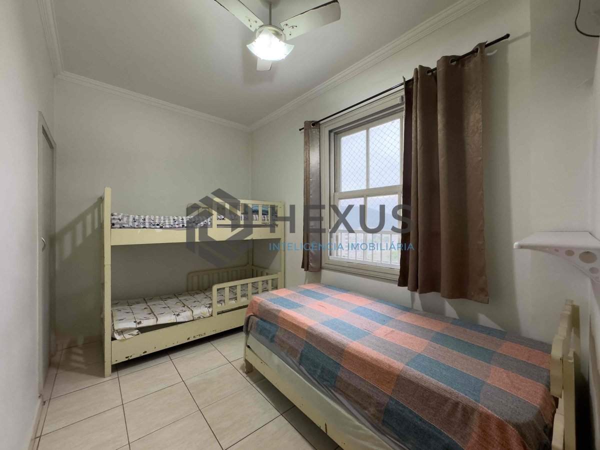 Foto 13 de Apartamento com varanda e vista livre a uma quadra da Praia das Pitangueiras de 2 quartos com 1 vaga, Guarujá-SP