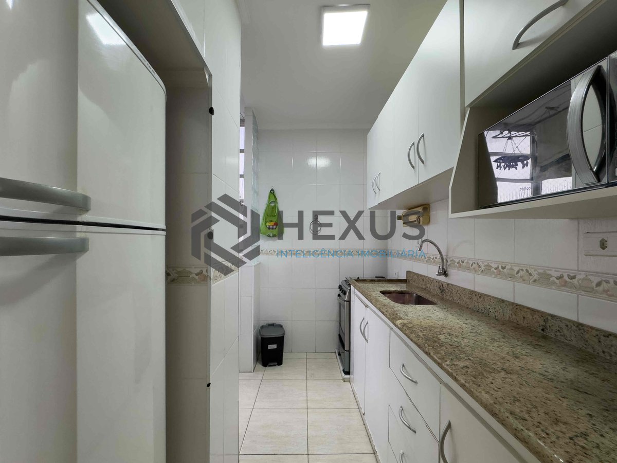 Foto 16 de Apartamento com varanda e vista livre a uma quadra da Praia das Pitangueiras de 2 quartos com 1 vaga, Guarujá-SP