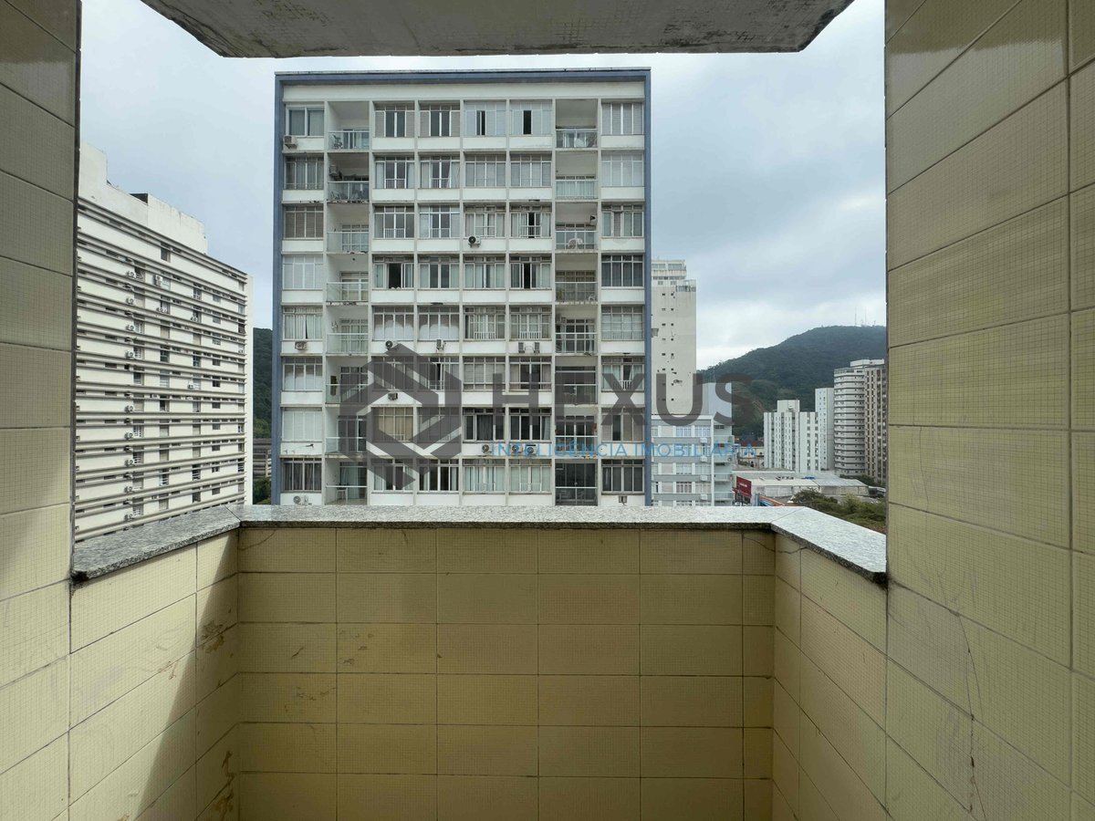 Foto 6 de Apartamento com varanda e vista livre a uma quadra da Praia das Pitangueiras de 2 quartos (1 suíte) com 1 vaga, Guarujá-SP