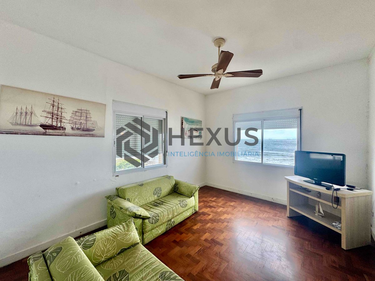 Foto 9 de Apartamento frente mar com varanda e vista mar na Praia das Pitangueiras, Guaruja