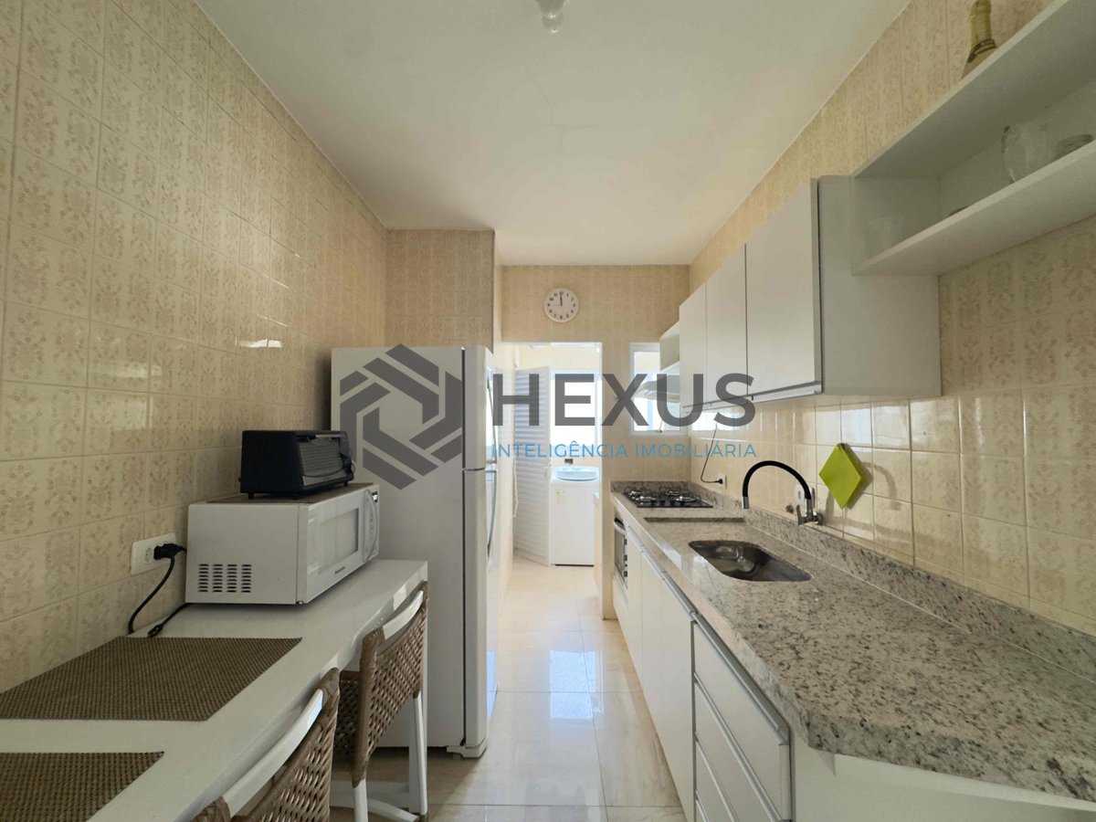 Foto 16 de Apartamento com varanda e vista mar a uma quadra da Praia das Pitangueiras de 2 quartos com 1 vaga, Guarujá-SP