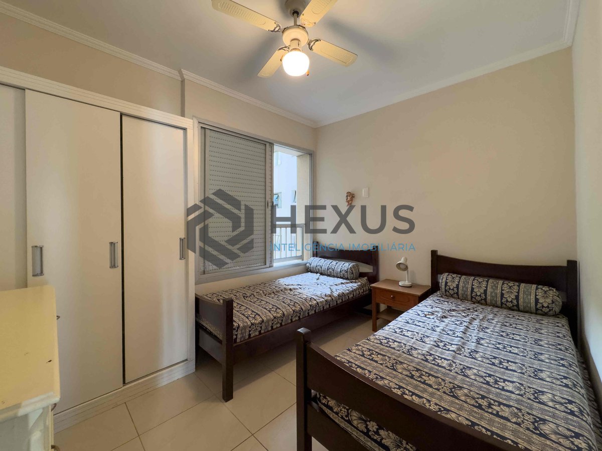 Foto 12 de Apartamento com varanda e vista livre a uma quadra da Praia das Pitangueiras de 2 quartos com 1 vaga, Guarujá-SP