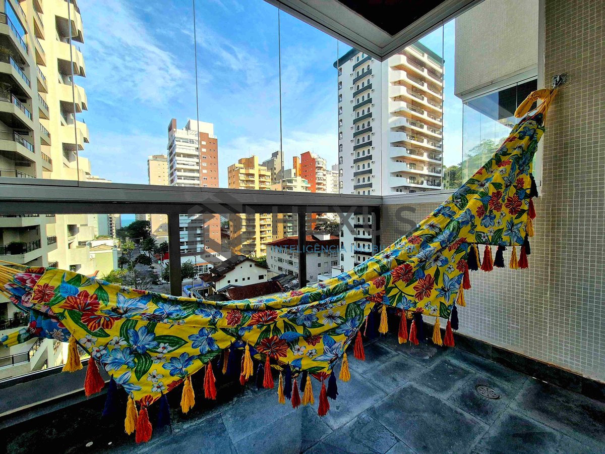 Foto 13 de Apartamento com varanda e lazer completo na Praia das Pitangueiras, Guaruja | Hexus