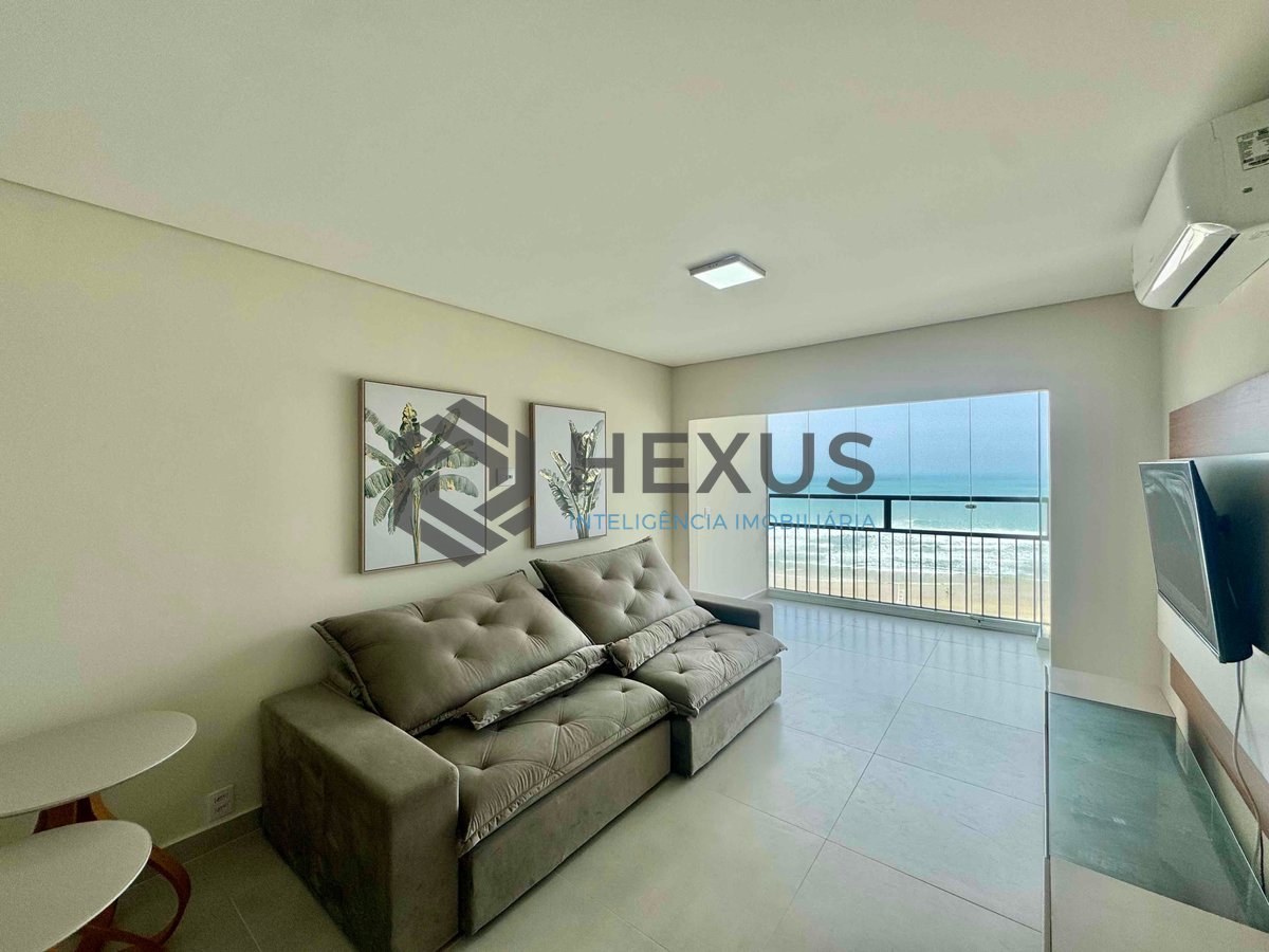 Foto 6 de Apartamento frente mar reformado com varanda e lazer na Praia das Pitangueiras, Guaruja