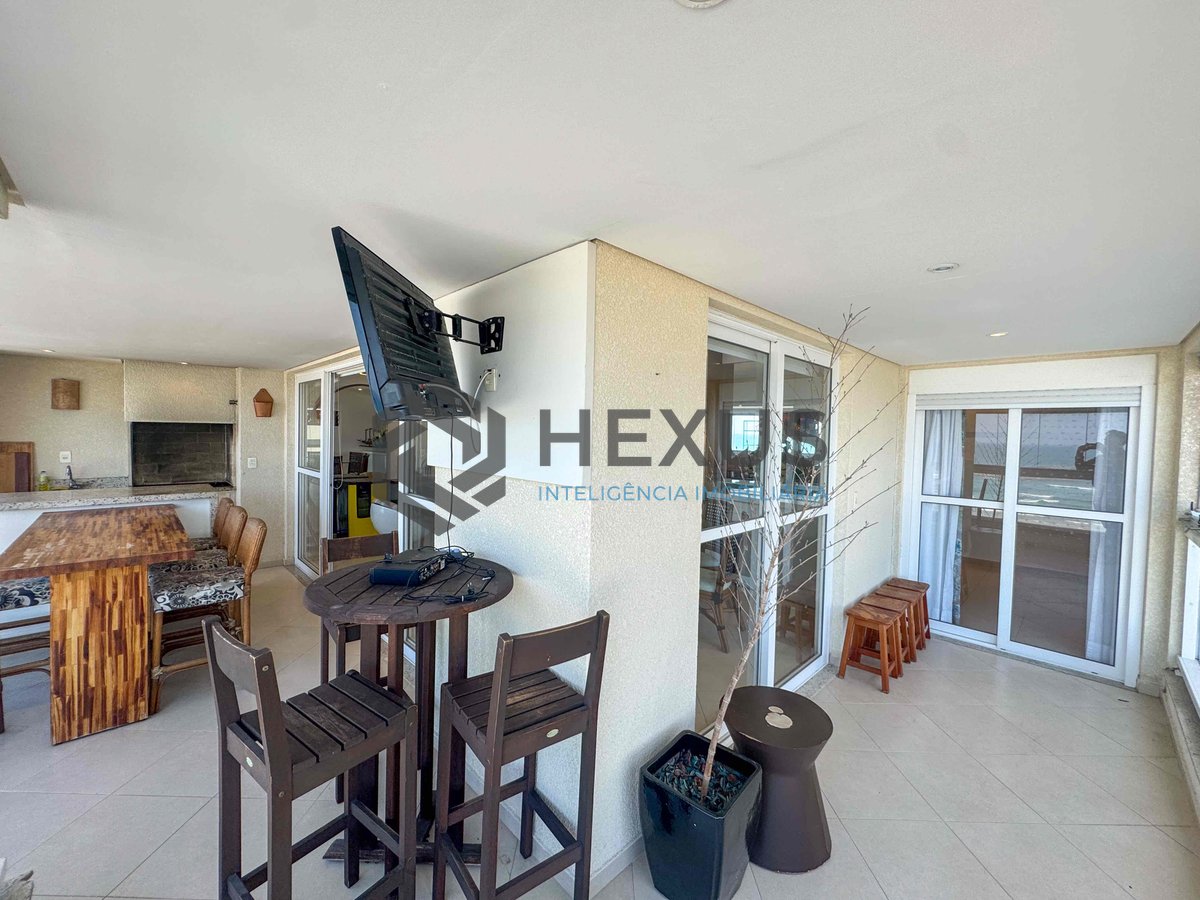 Foto 11 de Apartamento frente mar reformado com varanda gourmet vista mar e lazer na Praia das Pitangueiras, Guaruja