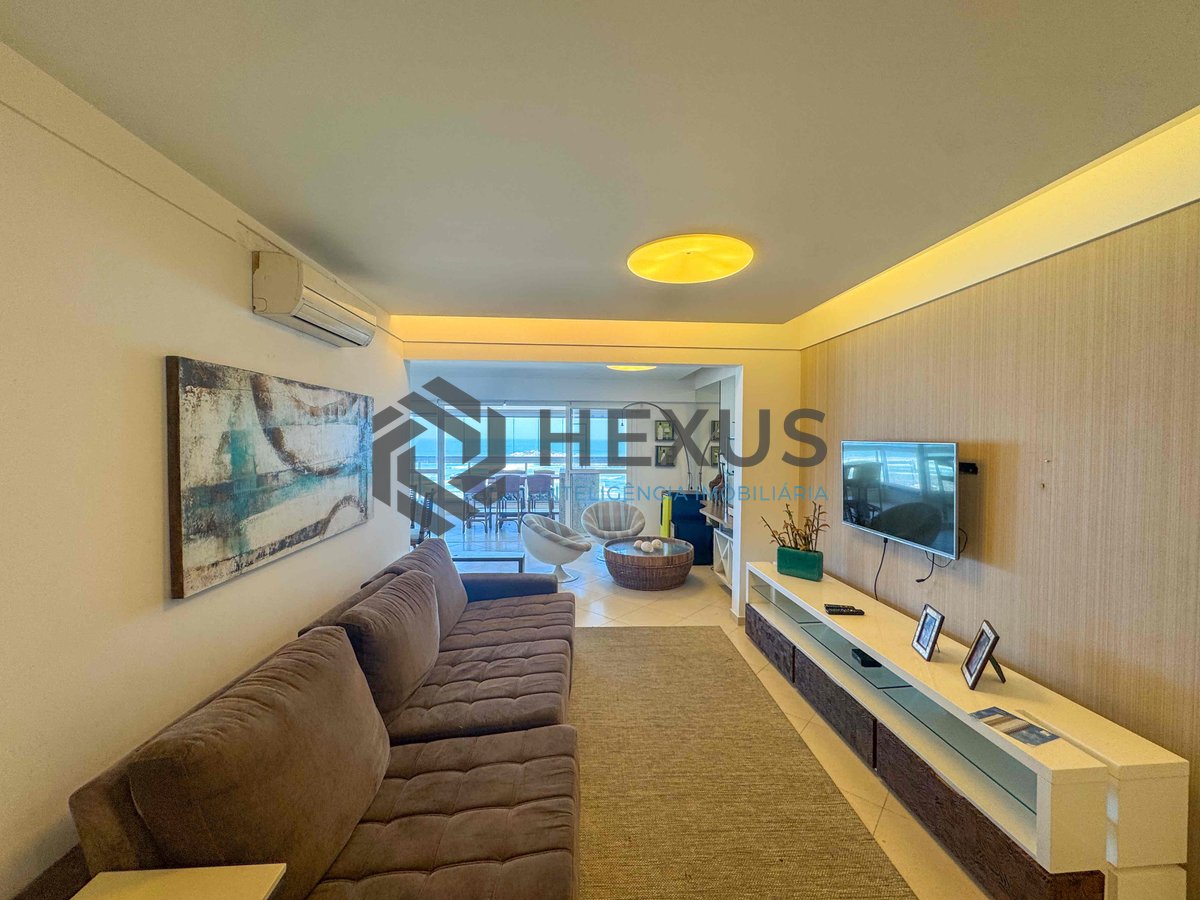 Foto 6 de Apartamento frente mar reformado com varanda gourmet vista mar e lazer na Praia das Pitangueiras, Guaruja