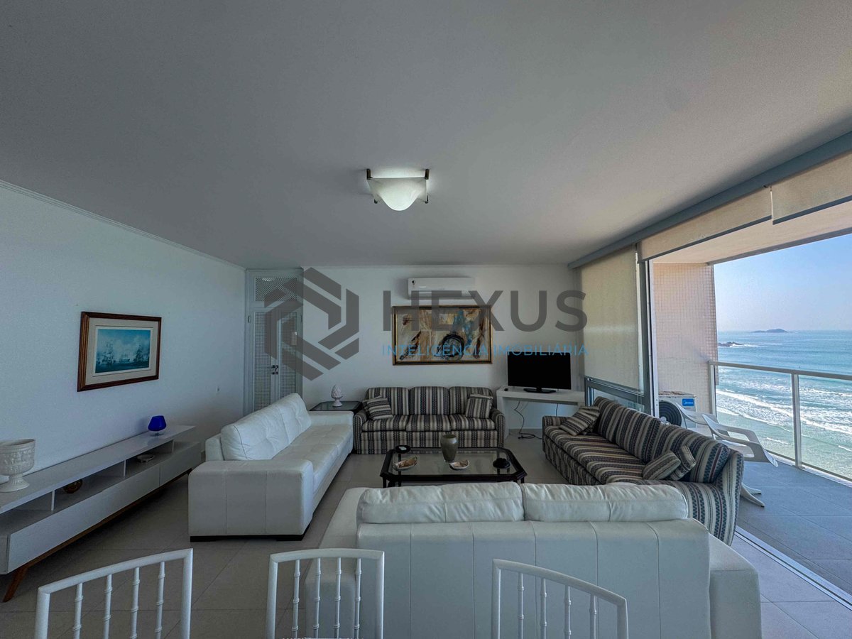 Foto 10 de Apartamento frente mar com varanda e vista mar na Praia das Pitangueiras, Guaruja