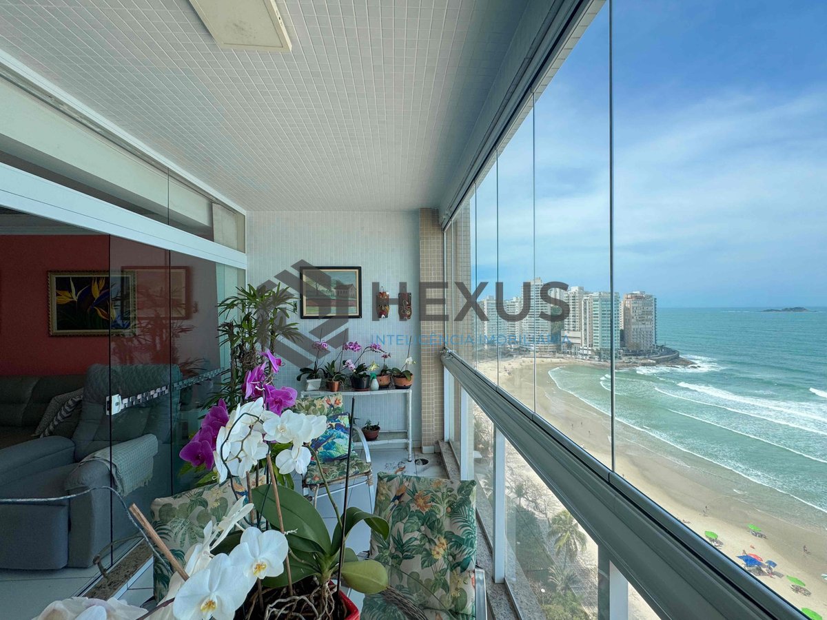Foto 16 de Apartamento reformado frente mar com varanda vista mar na Praia das Pitangueiras, Guaruja