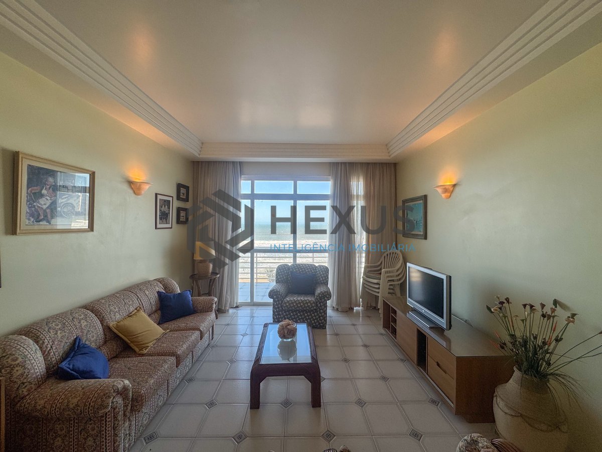 Foto 12 de Apartamento frente mar com varanda e vista mar na Praia das Pitangueiras, Guaruja