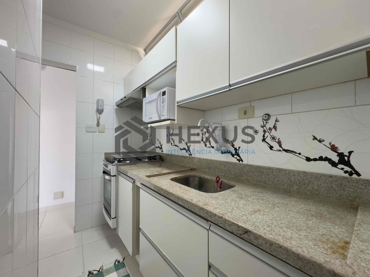 Foto 19 de Apartamento com varanda e vista mar na quadra mar da Praia das Pitangueiras, Guaruja