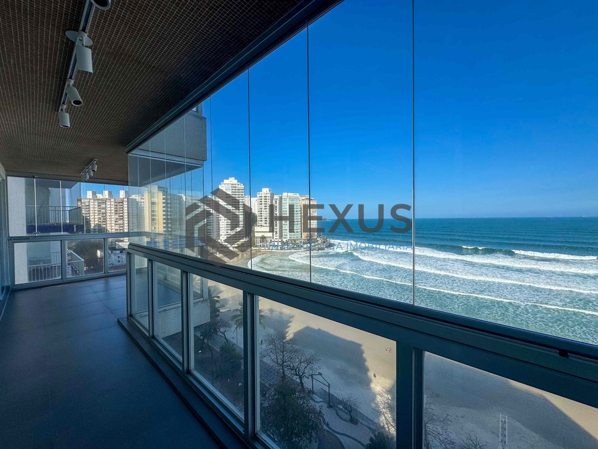 Foto 4 de Apartamento frente mar com varanda e vista mar na Praia das Pitangueiras, Guaruja