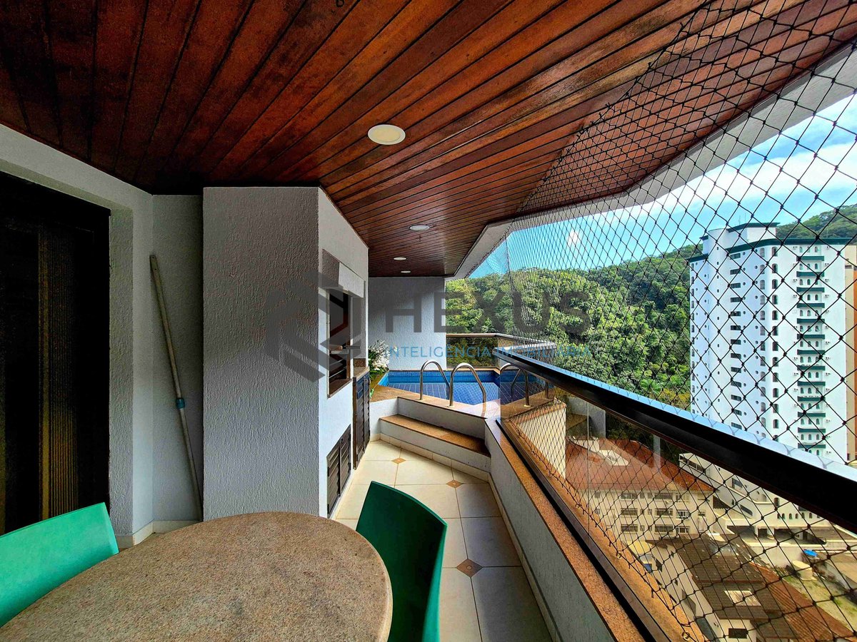 Foto 15 de Apartamento reformado com piscina e churrasqueira na varanda na Praia das Pitangueiras, Guaruja