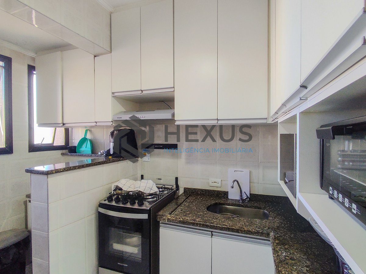 Foto 16 de Apartamento reformado com varanda e lazer a duas quadras da Praia do Tombo, Guaruja