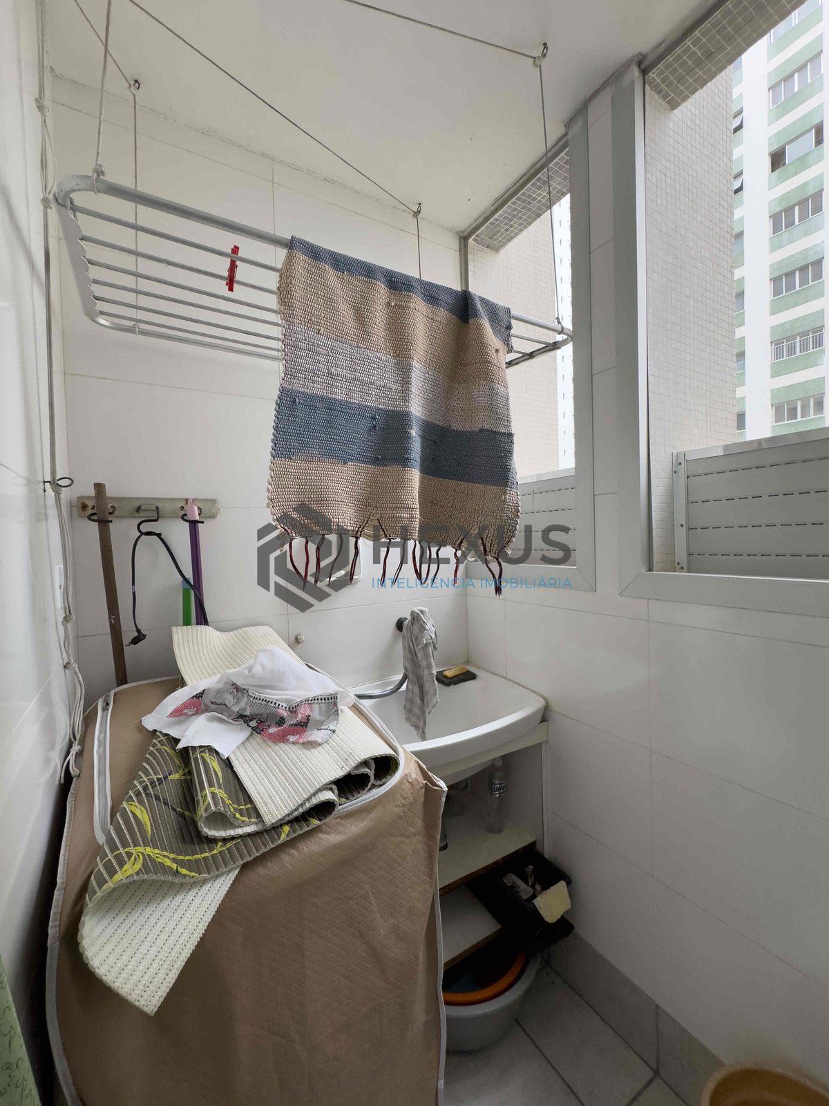 Foto 20 de Apartamento com varanda na a uma quadra da Praia das Pitangueiras, Guaruja