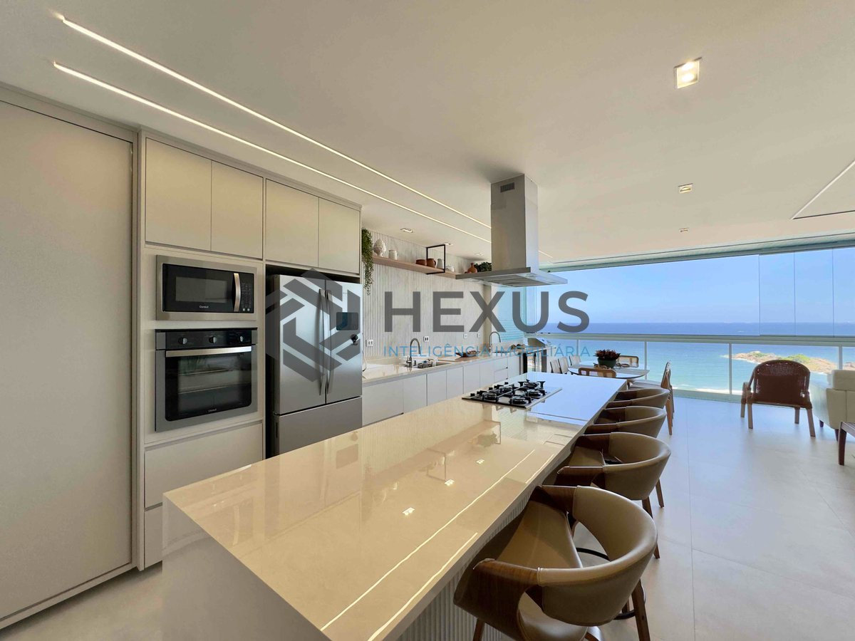 Foto 10 de Apartamento frente mar reformado com varanda e vista mar na Praia das Pitangueiras, Guaruja