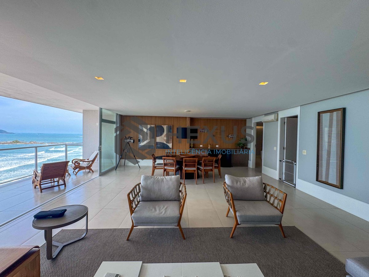 Foto 6 de Apartamento frente mar reformado com varanda e lazer na Praia das Pitangueiras, Guaruja