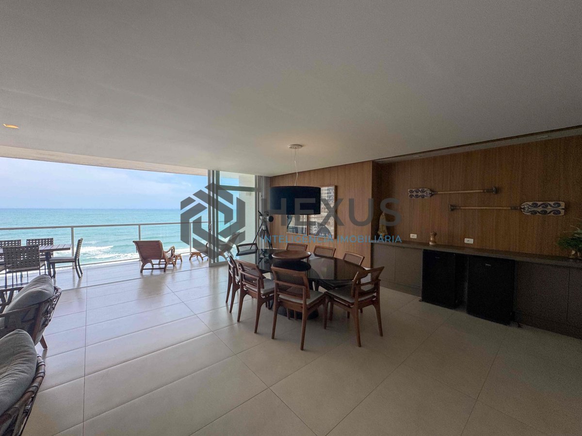 Foto 9 de Apartamento frente mar reformado com varanda e lazer na Praia das Pitangueiras, Guaruja