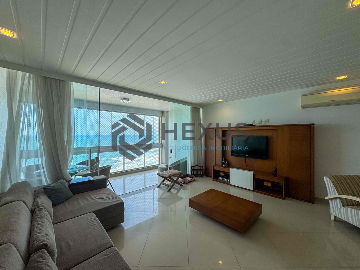 Foto 5 de Apartamento reformado frente mar com varanda e vista oceânica na Praia das Pitangueiras, Guaruja