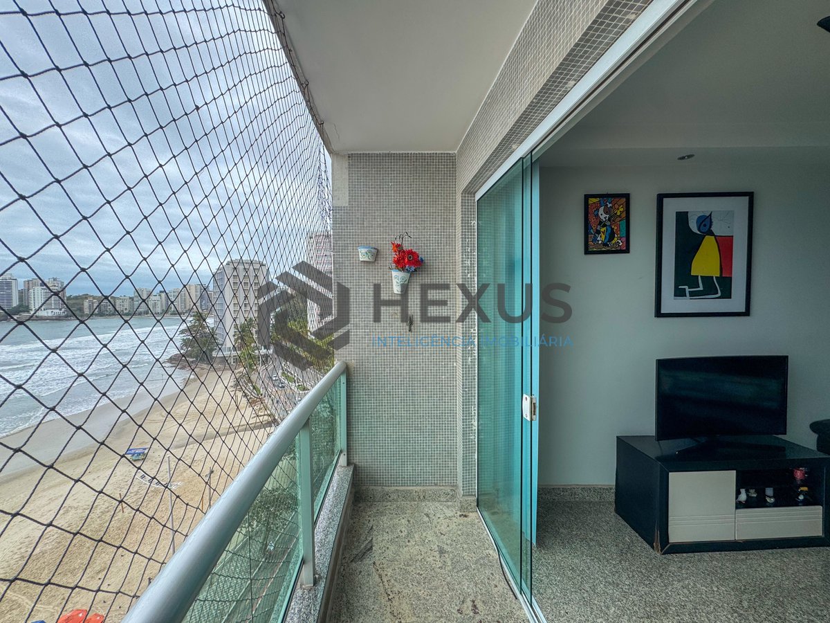 Foto 11 de Apartamento frente mar com varanda na Praia das Pitangueiras, Guaruja