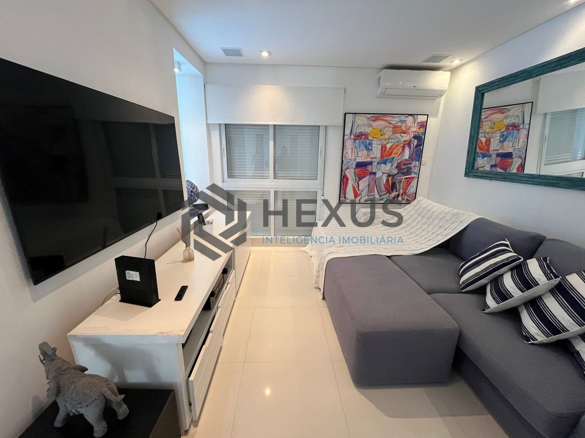 Foto 15 de Apartamento frente mar reformado com varanda na Praia das Pitangueiras, Guaruja