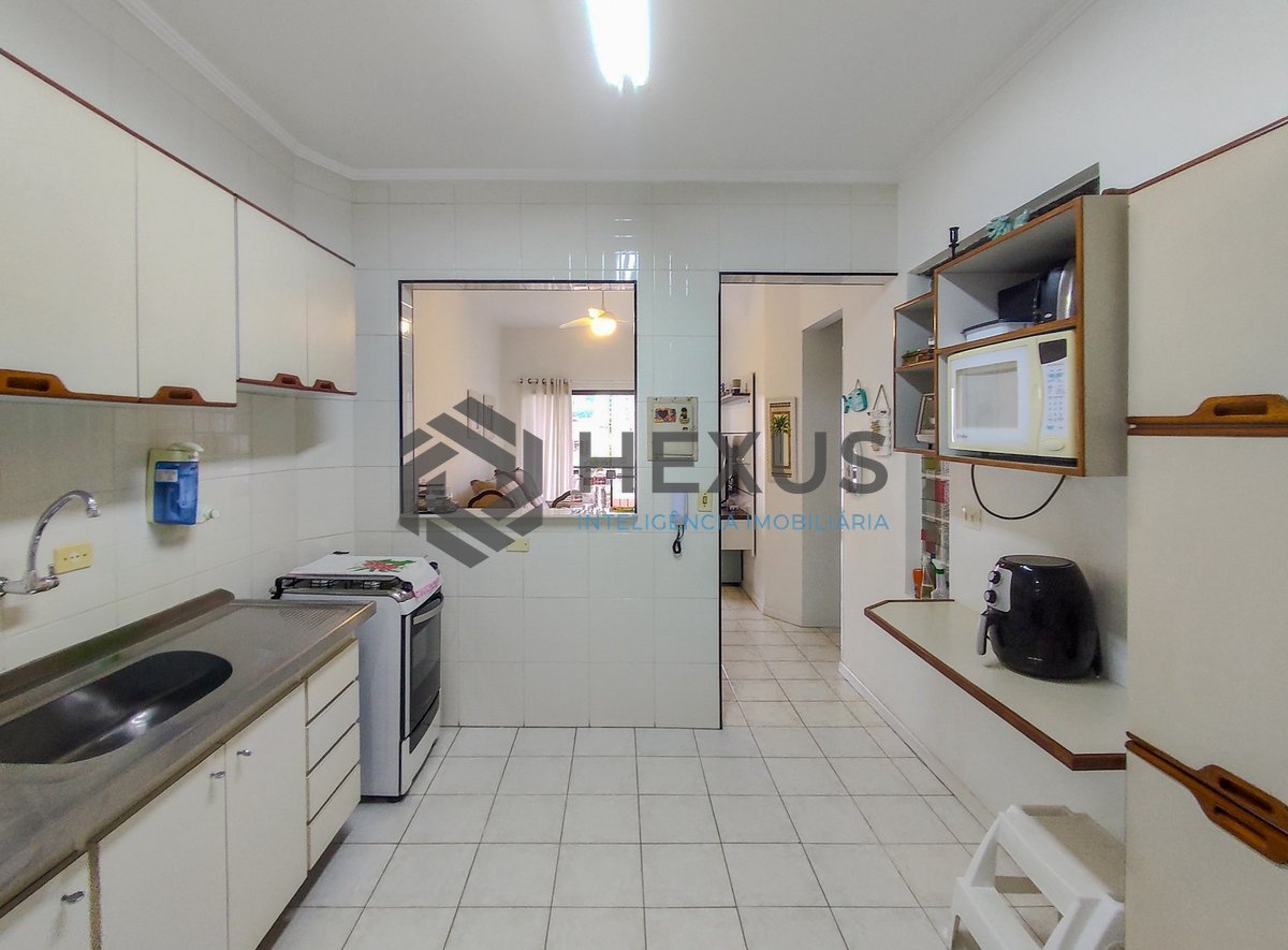 Foto 18 de Apartamento reformado com varanda a venda na praia das Asturias, Guaruja