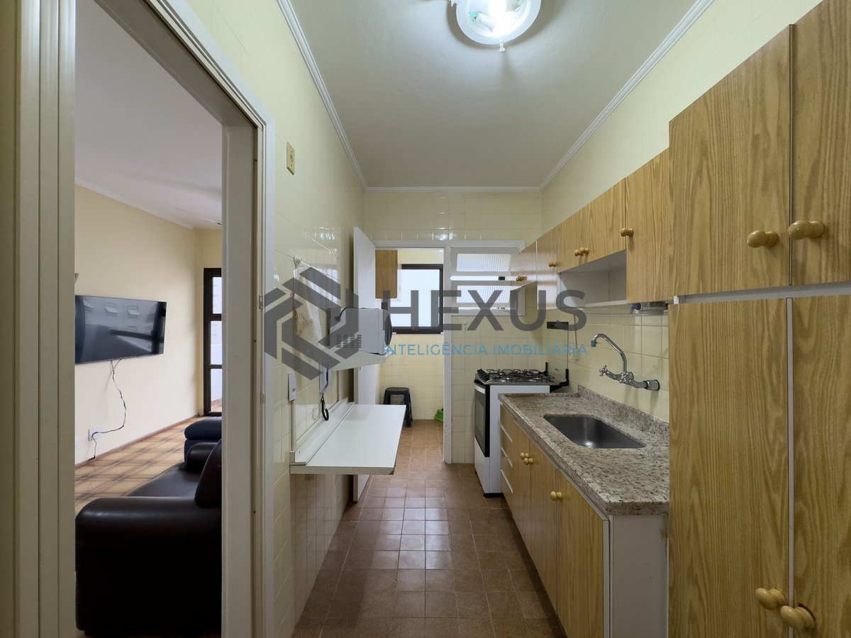 Foto 14 de Apartamento com varanda a uma quadra da Praia das Pitangueiras, Guaruja
