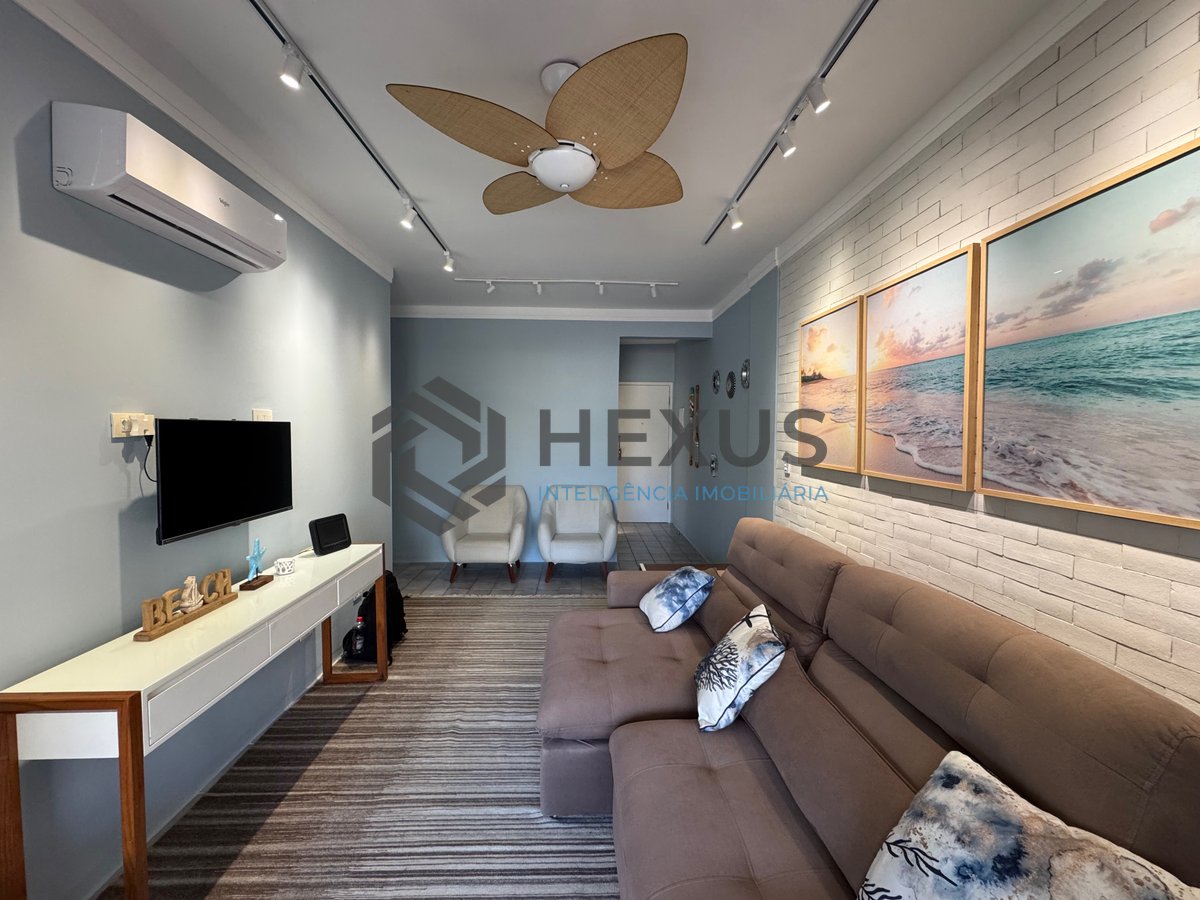 Foto 4 de Apartamento reformado e mobiliado com varanda a venda na praia das Asturias, Guaruja