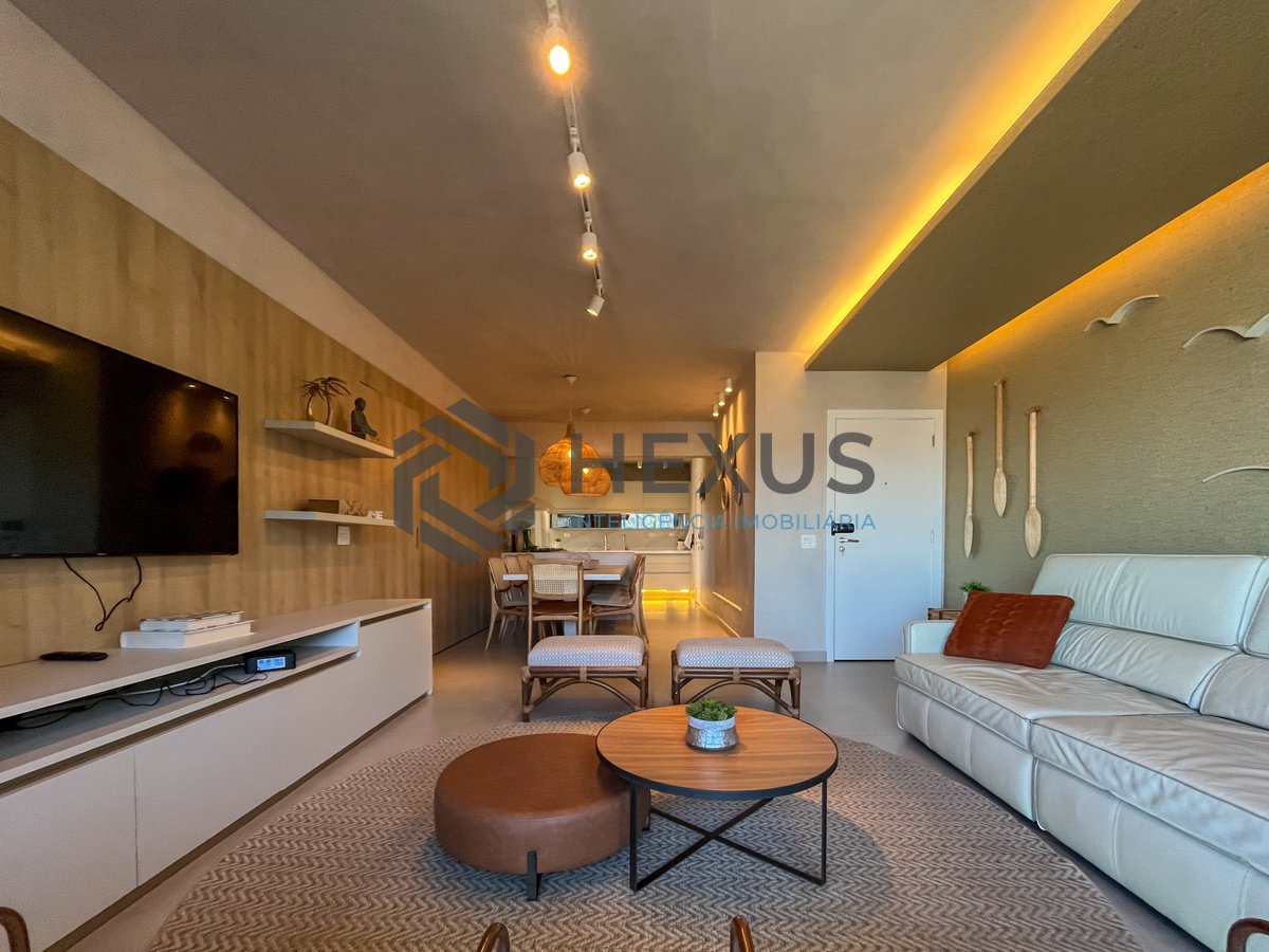 Foto 4 de Apartamento frente mar com varanda e lazer na Praia das Pitangueiras, Guaruja