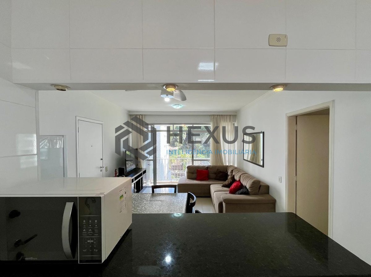 Foto 7 de Apartamento reformado com varanda e lazer na Praia das Pitangueiras, Guaruja