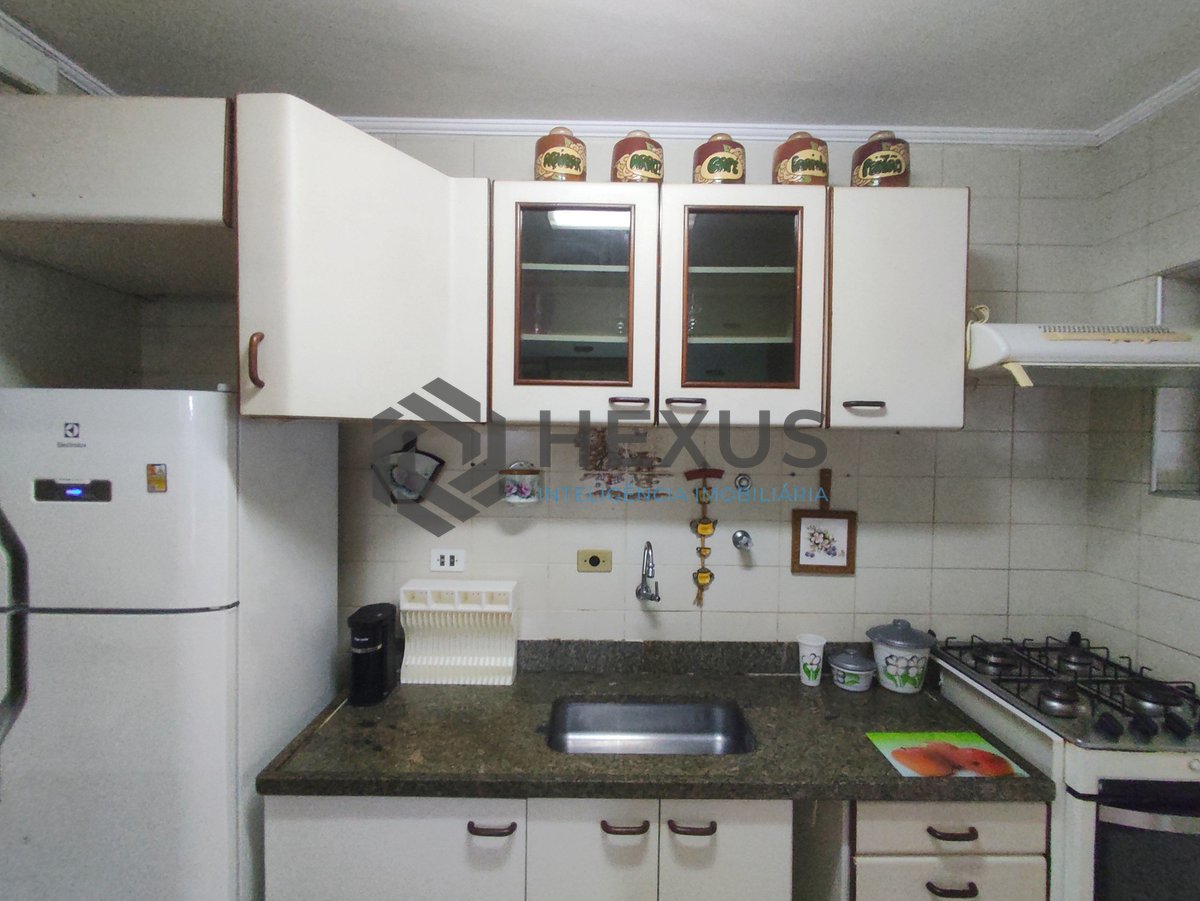 Foto 19 de Apartamento frente rua com varanda e vista livre na Praia da Enseada, Guaruja