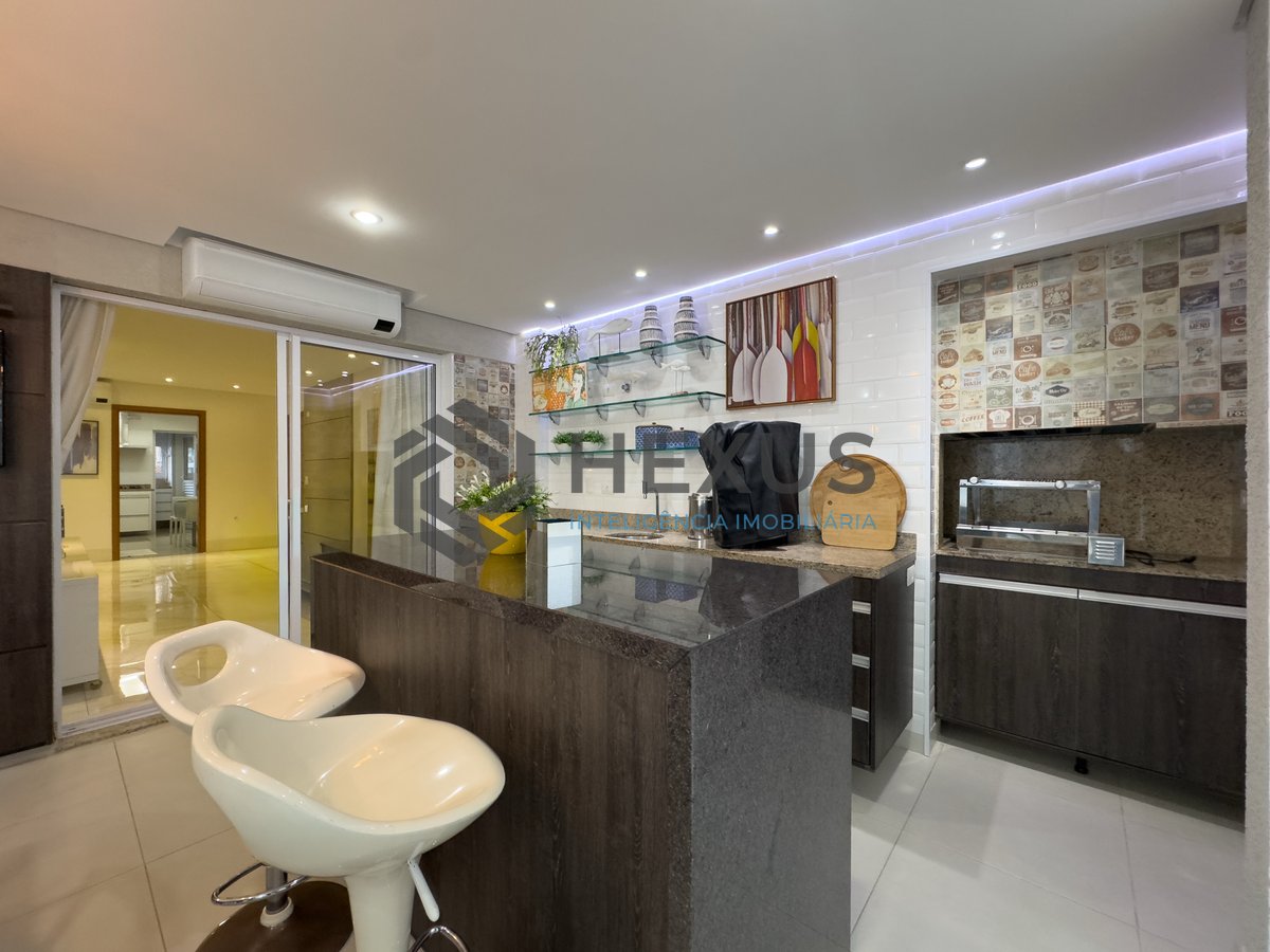 Foto 11 de Apartamento reformado com varanda gourmet e lazer na Praia das Pitangueiras, Guaruja