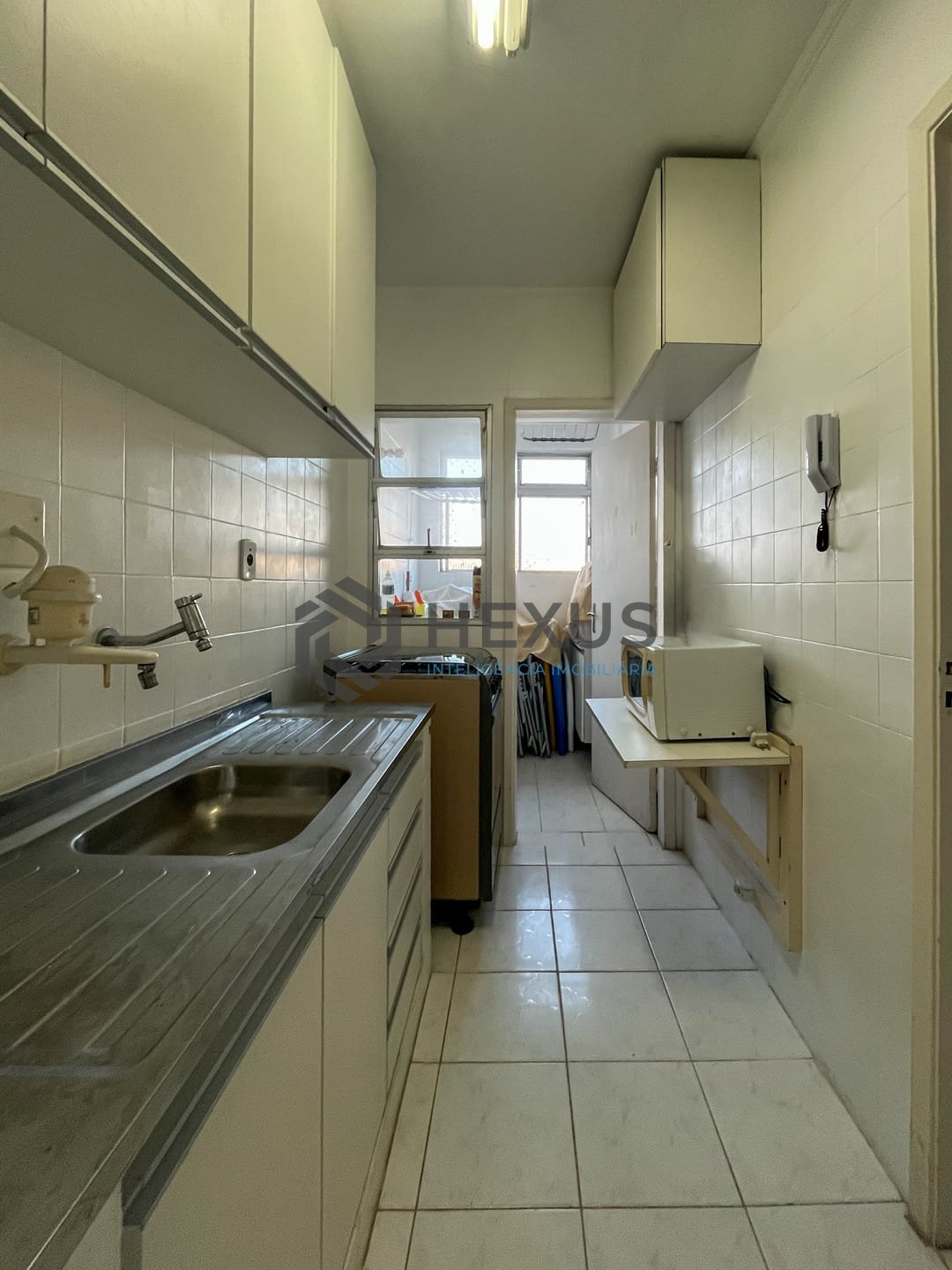 Foto 11 de Apartamento com varanda e lazer a uma quadra da Praia das Pitangueiras, Guaruja