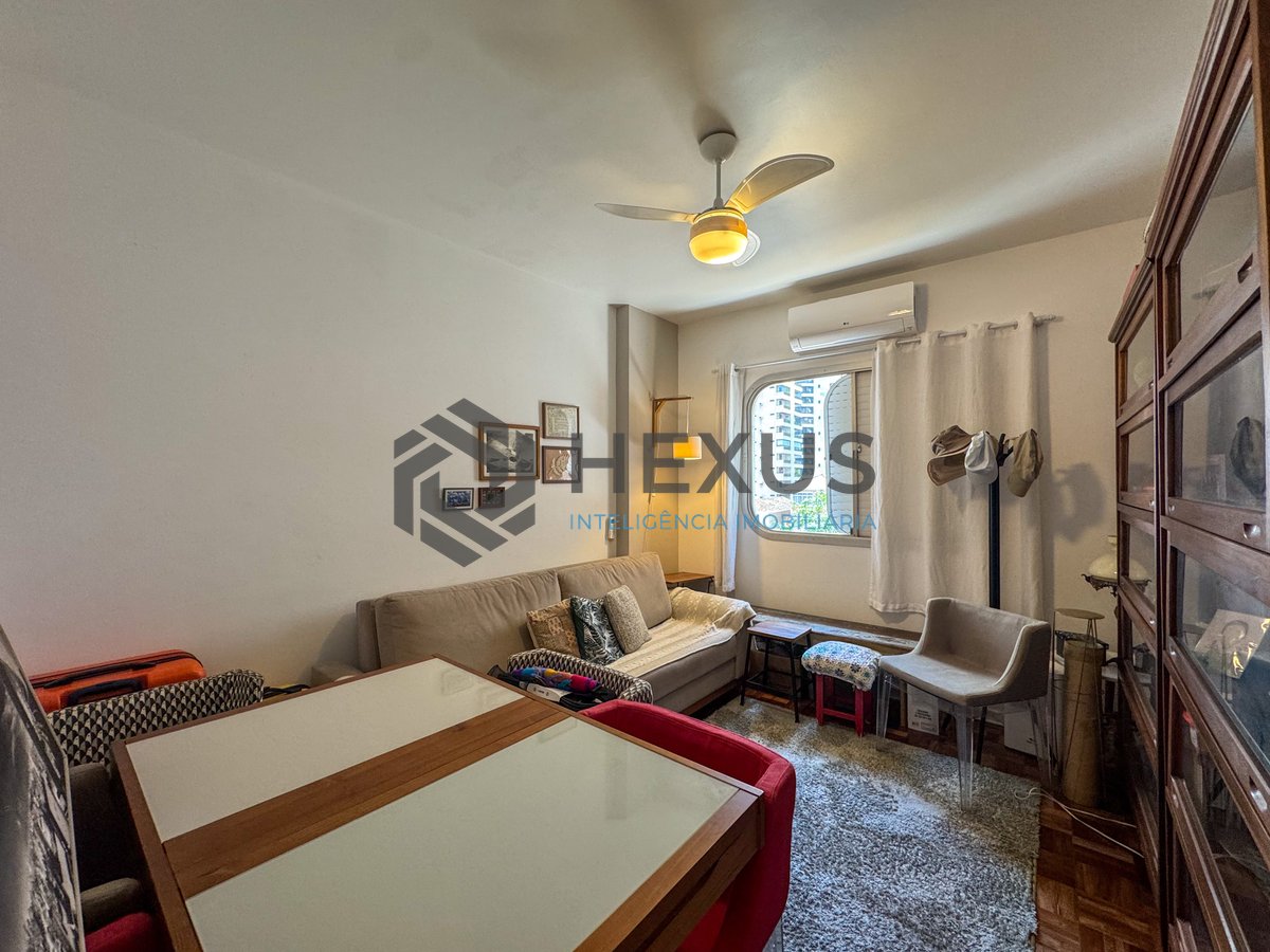 Foto 8 de Apartamento reformado com varanda na Praia das Pitangueiras, Guaruja