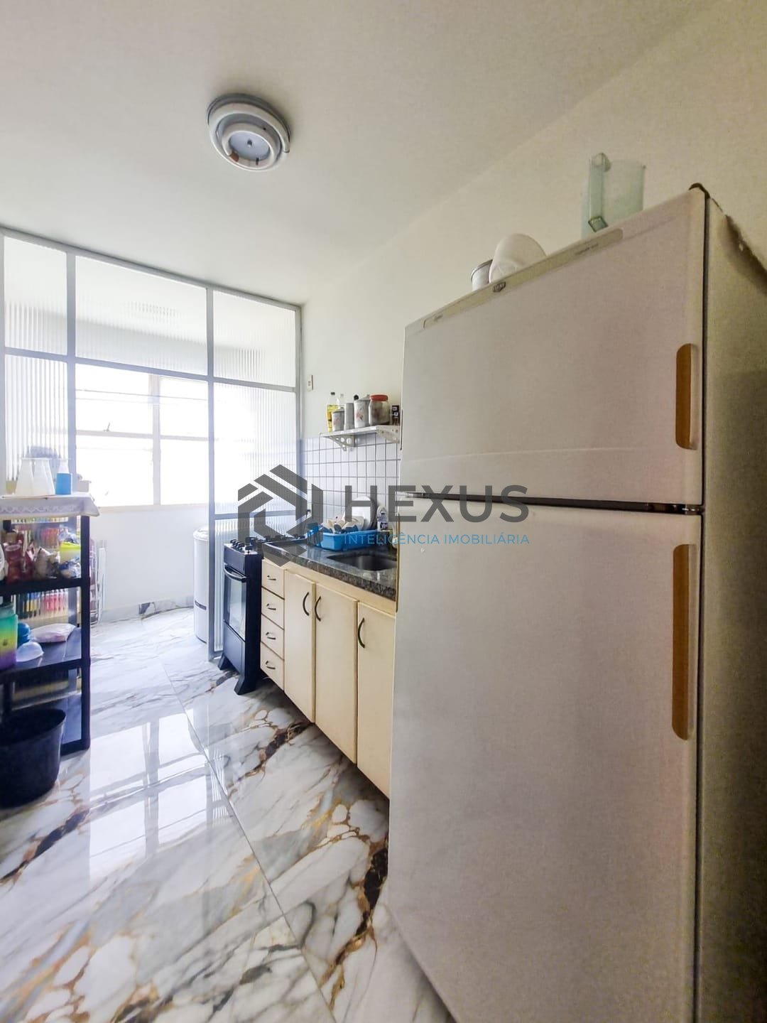 Foto 17 de Apartamento reformado com varanda e lazer na Praia da Enseada, Guaruja