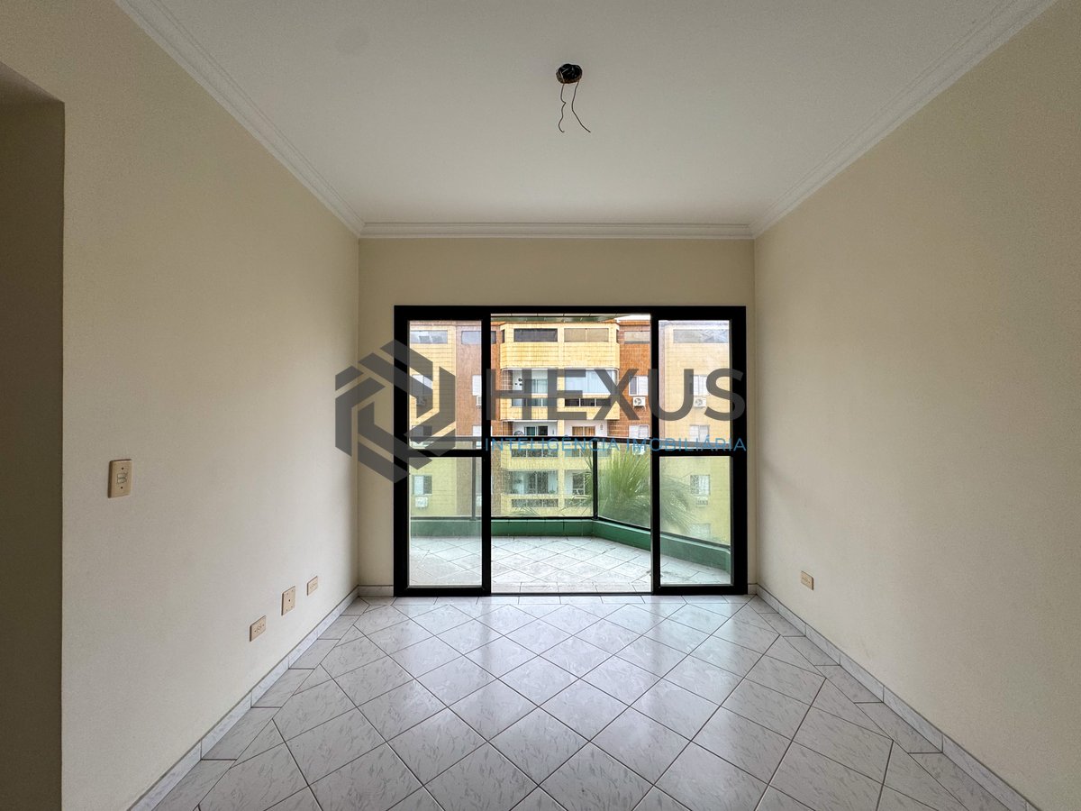 Foto 6 de Apartamento frente rua com varanda e lazer na Praia das Asturias, Guaruja