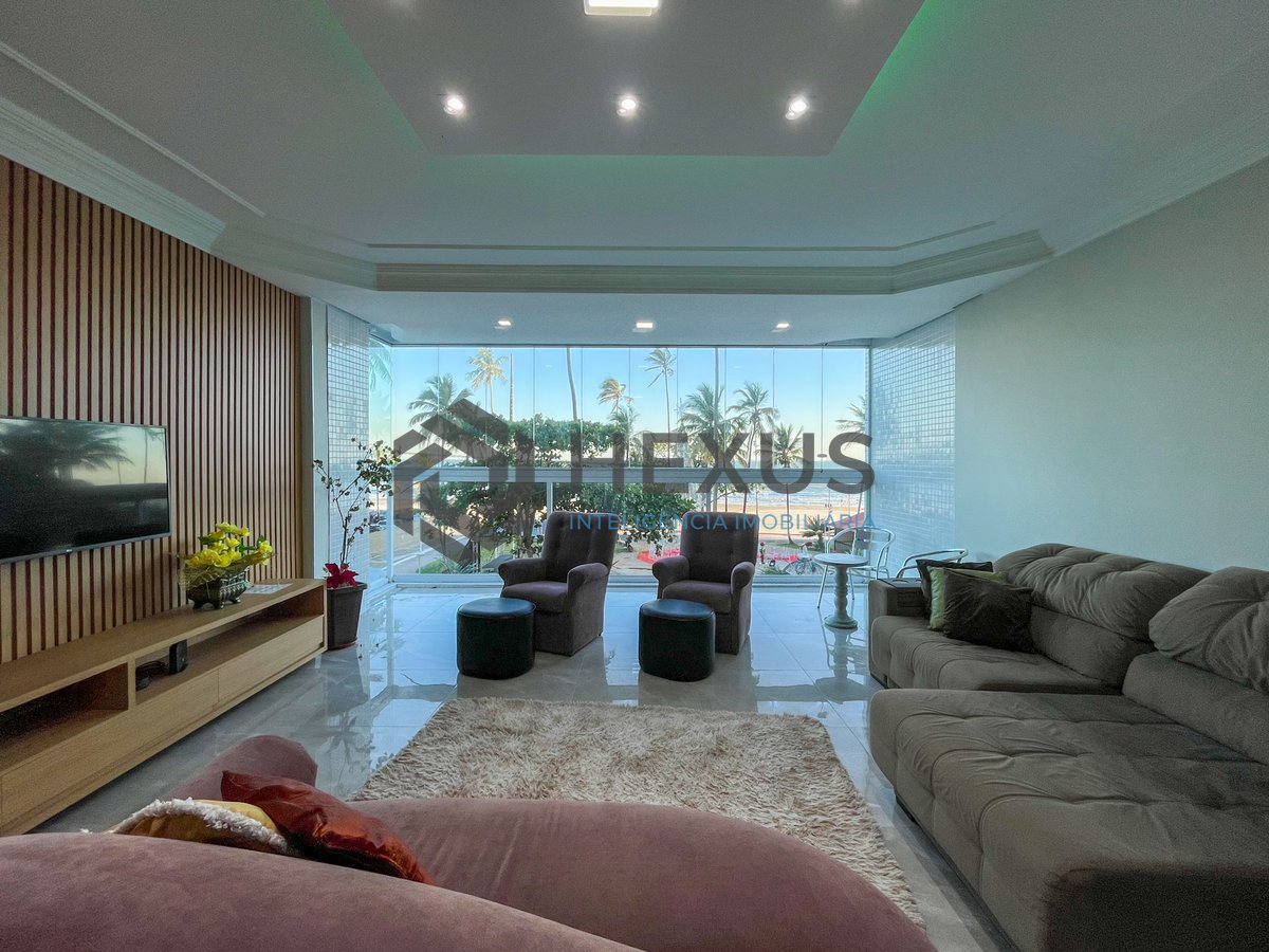 Foto 5 de Apartamento garden frente mar com quintal e área gourmet na Praia das Pitangueiras, Guaruja