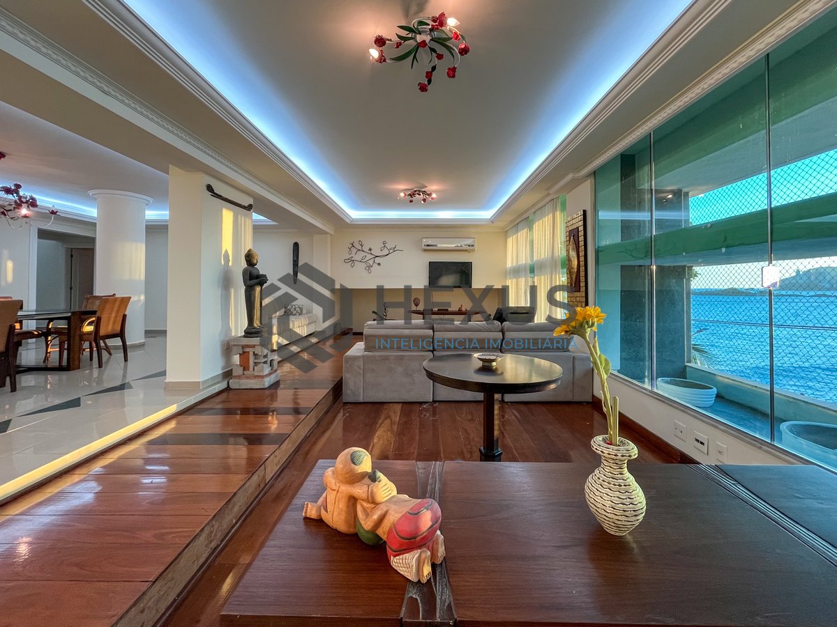 Foto 6 de Apartamento frente mar reformado com com quintal e varanda na Praia das Pitangueiras, Guaruja