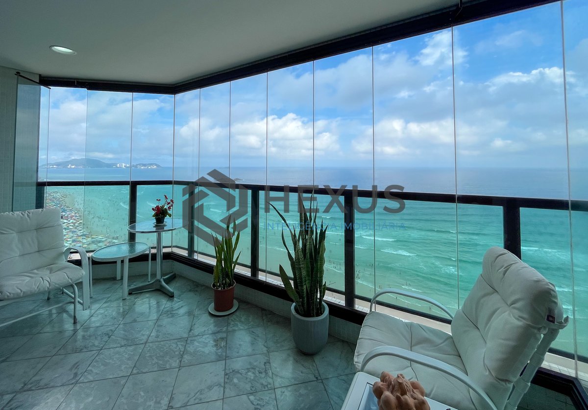 Foto 12 de Apartamento frente mar com varanda e lazer na Praia das Pitangueiras, Guaruja