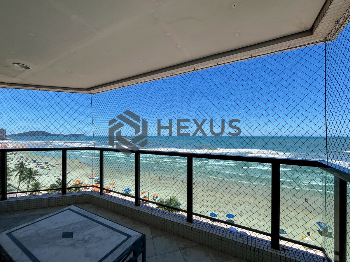 Foto 5 de Apartamento reformado frente mar com varanda e lazer na Praia das Pitangueiras, Guaruja