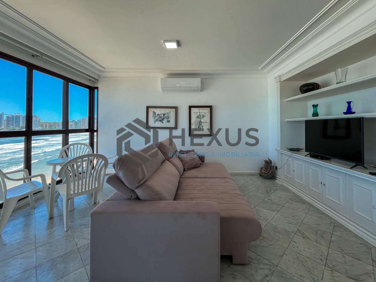 Foto 8 de Apartamento reformado frente mar com varanda e lazer na Praia das Pitangueiras, Guaruja