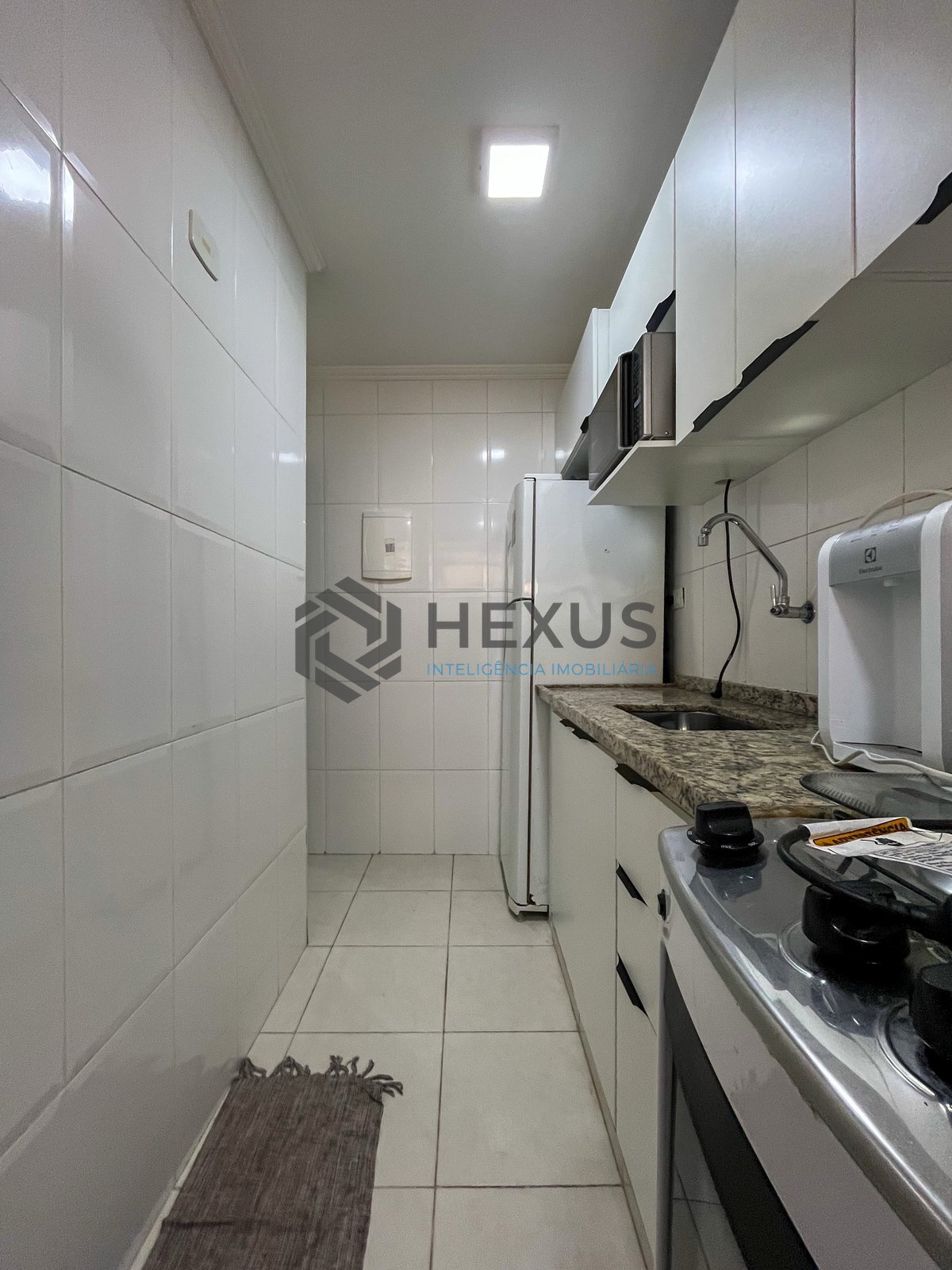 Foto 15 de Apartamento com custo baixo a uma quadra da Praia das Pitangueiras, Guaruja